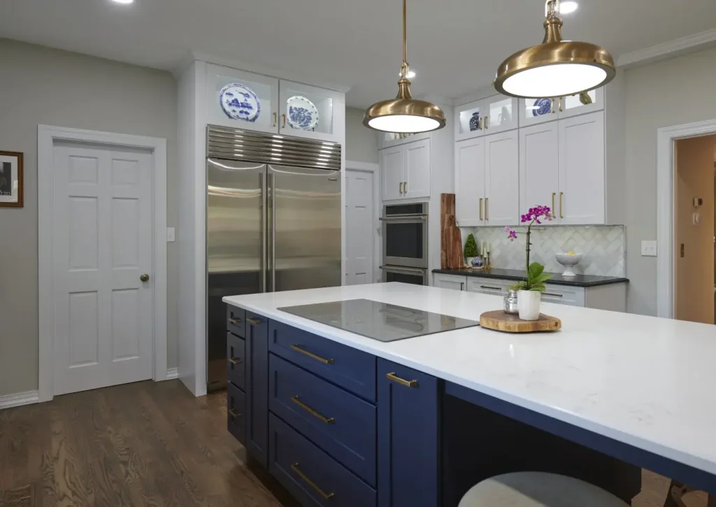 Tulsa homeowner relaxing in a tidy living space during a home remodel by Powers Design & Build