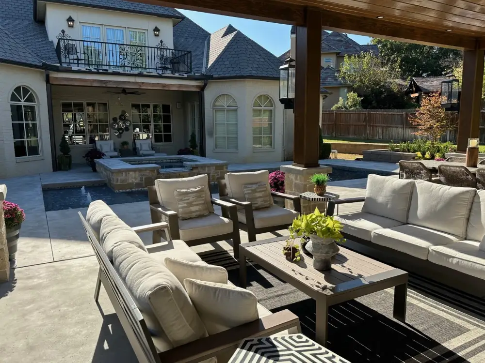 Elegant Tulsa backyard with patio seating, pool, and modern outdoor design